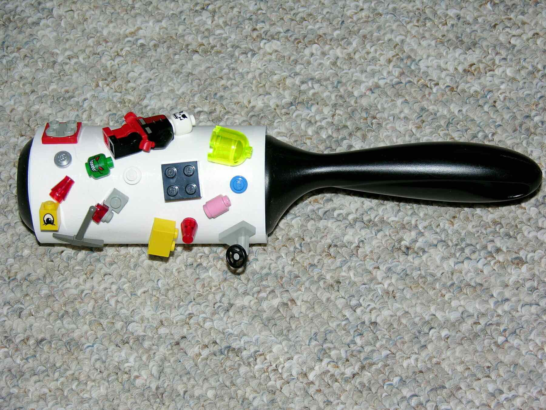 “Lint Roller with Lego on it - CCA https://www.flickr.com/photos/8331761@N07/2502131903 musicmoon@rogers.com DSCN0627”